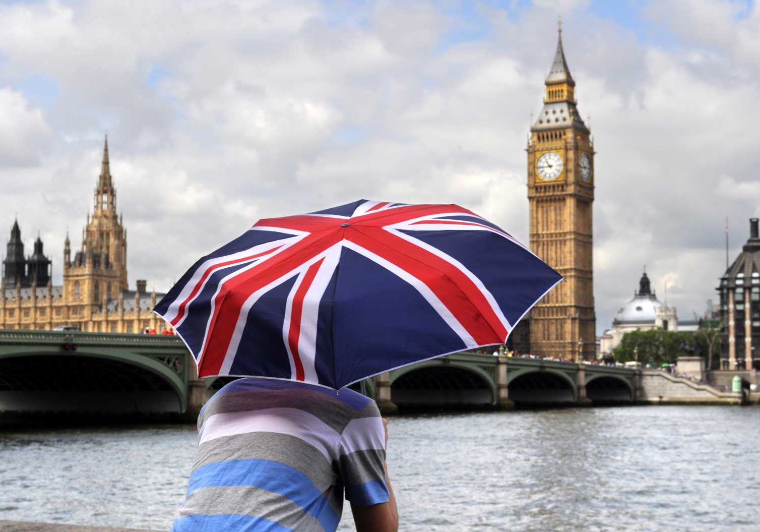 rear-view-young-man-looking-river-thames